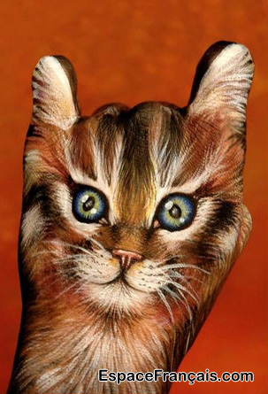 Peinture sur main représentant un chat. C'est le fruit d'une imagination reproductive. Peinture sur main représentant un chat. C'est le fruit d'une imagination reproductive.